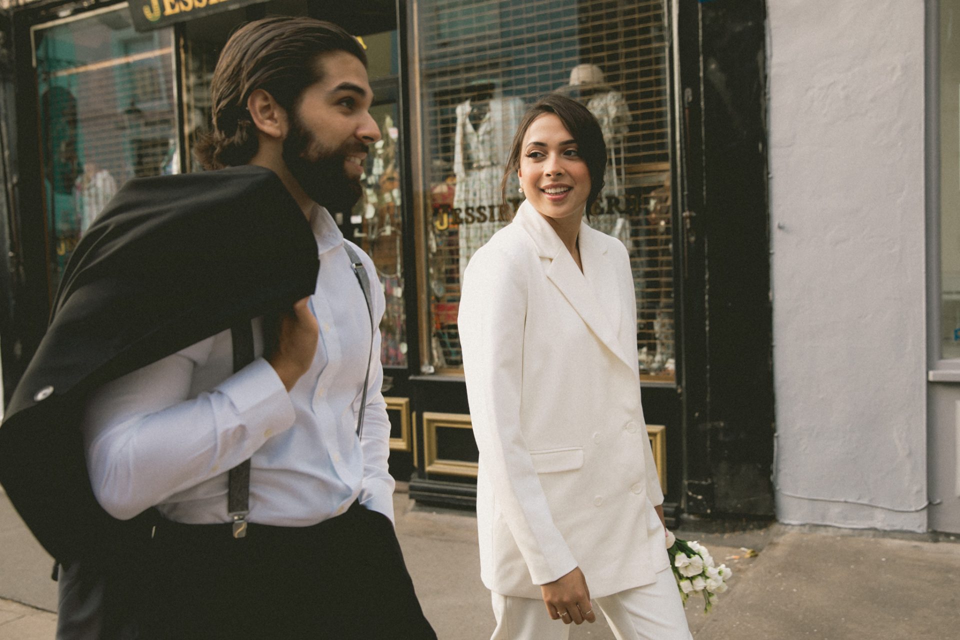 Aliyah and Osman walking through a London street
